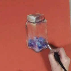 Un bocal de pigments au pastel